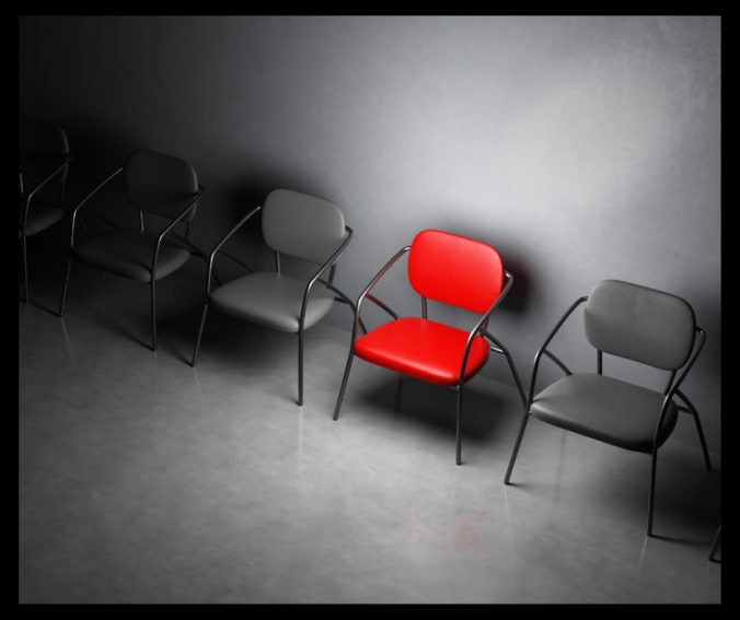 Käänteinen suorahaku ja rekrytointi – punainen tuoli erottuu harmaiden joukosta symboloiden parasta osaajaa.